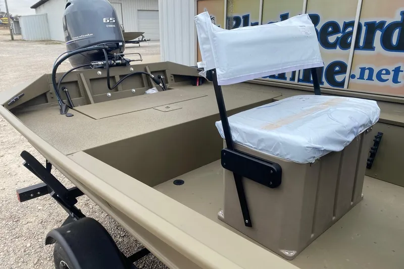 Slide: The Image of 2026 G3 Gator Tough 17 CCJ boat with Yamaha 65 engine, beige interior. - 7