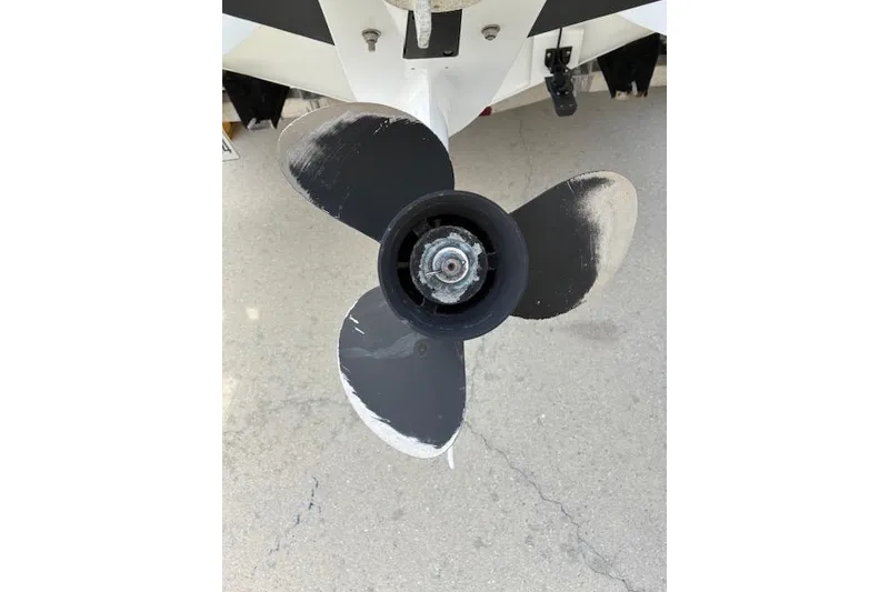Slide: The Image of Propeller of 2021 Highfield Sport 520 boat on concrete surface. - 11