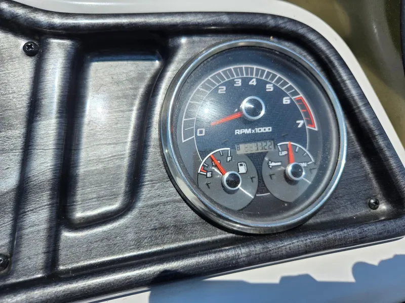 Slide: The Image of Dashboard of 2021 Godfrey SWEETWATER 2286 SFL showing RPM and fuel gauges. - 23