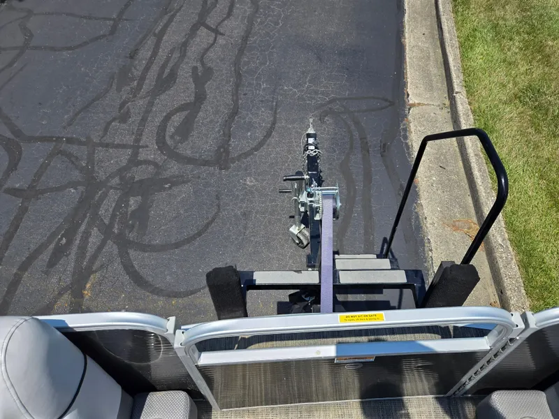 Slide: The Image of 2021 Godfrey SWEETWATER 2286 SFL boat trailer hitch on asphalt road. - 25