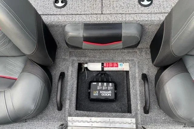 Slide: The Image of 2023 Tracker Pro Team 195 TXW Tournament Edition boat interior with storage compartment. - 21