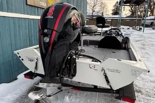 Slide: The Image of 2023 Tracker Pro Team 195 TXW Tournament Edition boat with powerful outboard motor. - 4