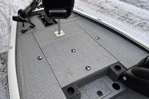 Slide: The Image of 2023 Tracker Pro Team 195 TXW Tournament Edition boat deck with seating and storage compartments. - 7