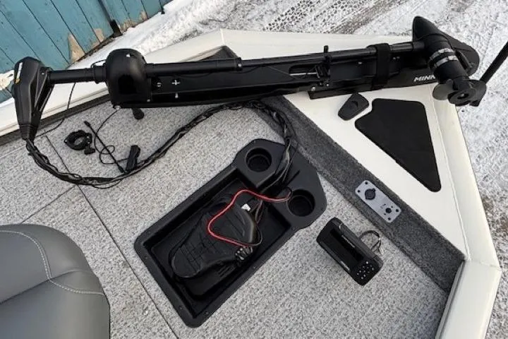 Slide: The Image of 2023 Tracker Pro Team 195 TXW Tournament Edition boat deck with trolling motor and accessories. - 8