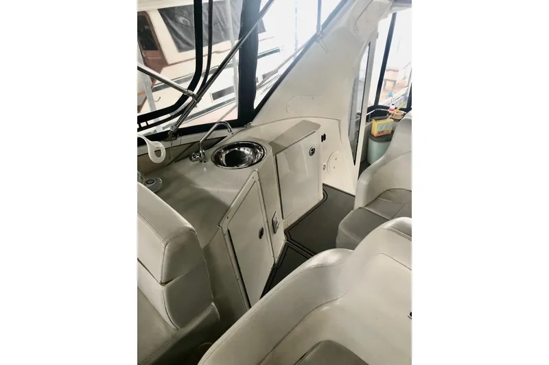 Slide: The Image of 2005 Carver 444 Cockpit Motor Yacht interior with seating and sink area. - 40