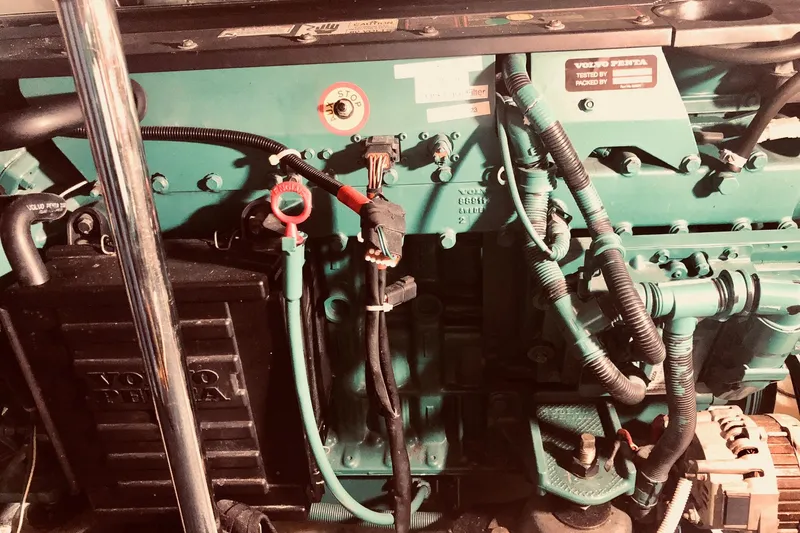 Slide: The Image of Engine compartment of a 2005 Carver 444 Cockpit Motor Yacht with Volvo Penta components. - 86