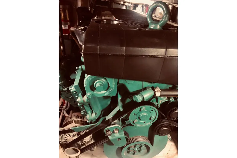 Slide: The Image of Engine of 2005 Carver 444 Cockpit Motor Yacht, showcasing mechanical components. - 77