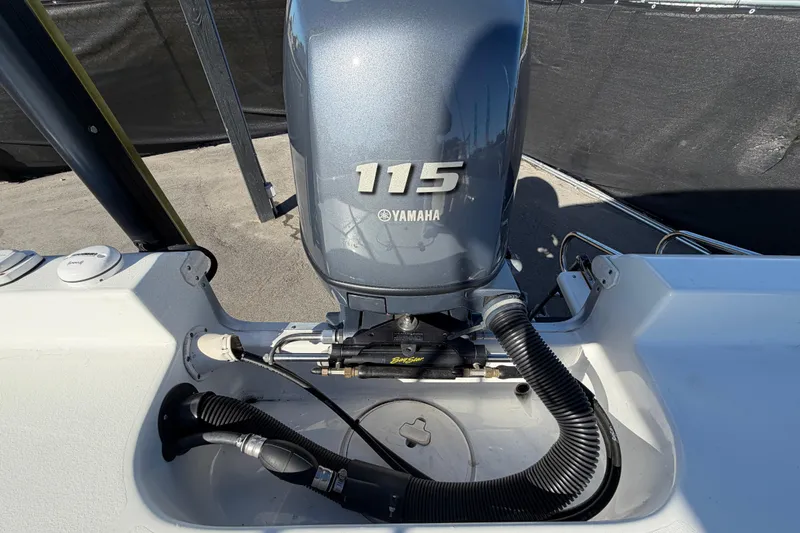 Slide: The Image of 2013 Sea Hunt XP 19 boat with Yamaha 115 outboard motor. - 63