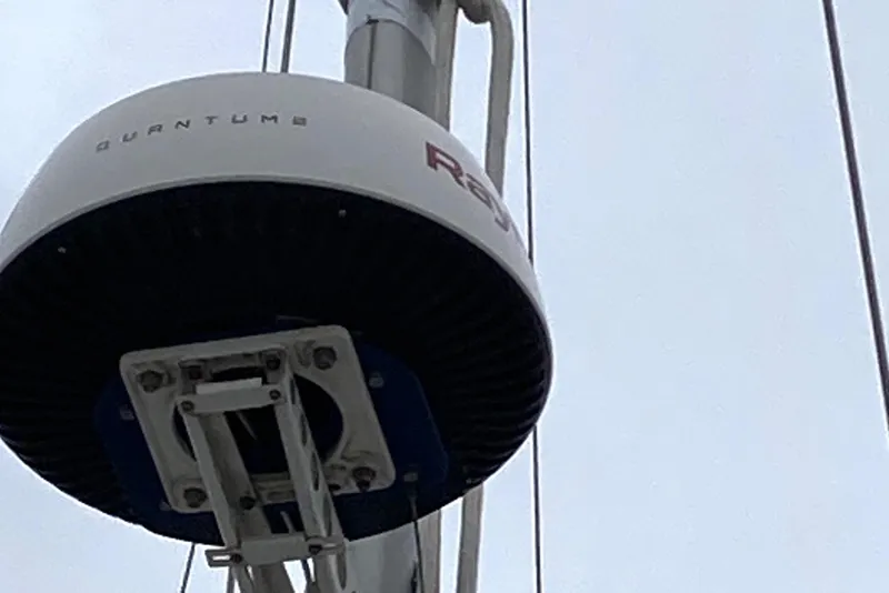 Slide: The Image of Radar equipment on 1987 Nauticat 38 sailboat mast against cloudy sky. - 20