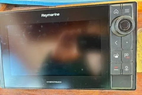 Slide: The Image of Raymarine HybridTouch display on 1987 Nauticat 38 sailboat dashboard. - 30