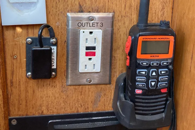 Slide: The Image of Radio and outlet panel on 1987 Nauticat 38 boat interior. - 33