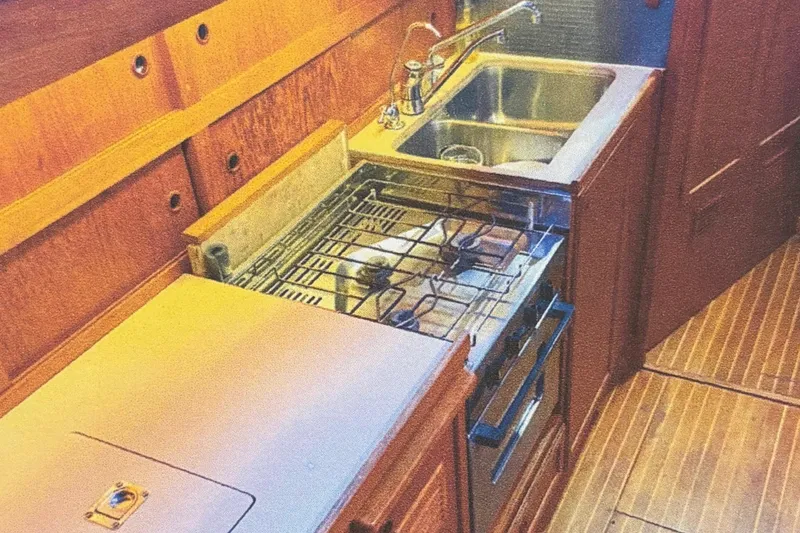 Slide: The Image of Galley kitchen in 1987 Nauticat 38 sailboat with stove and sink. - 35