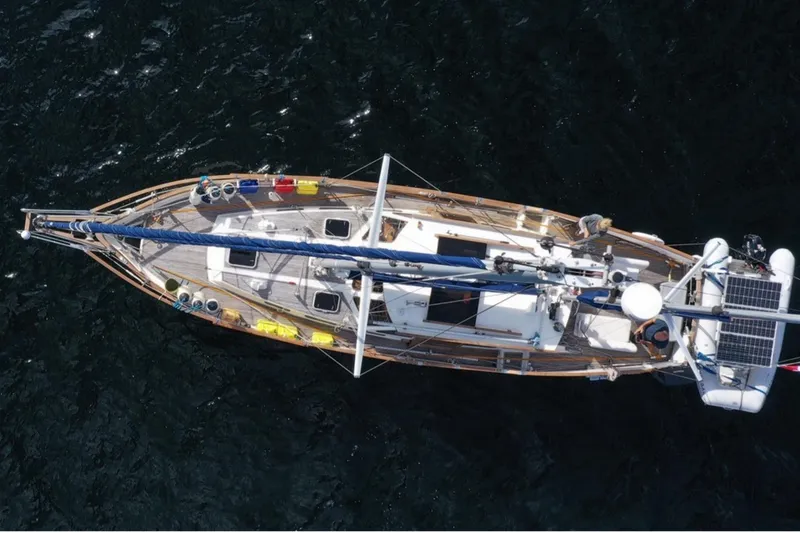 Slide: The Image of Aerial view of 1987 Nauticat 38 sailboat on dark water. - 4