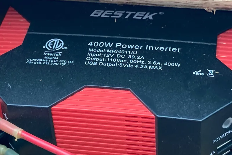 Slide: The Image of 400W power inverter, model MRI4011IU, with USB output, in a 1987 Nauticat 38. - 52