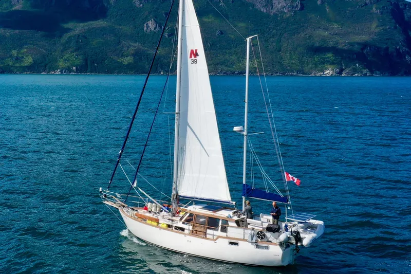 Slide: The Image of Sailing yacht Nauticat 38, 1987 model, cruising on a scenic blue ocean. - 66