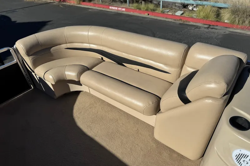 Slide: The Image of Beige seating on 2011 Harris Cruiser 220 CX boat, outdoor setting. - 12