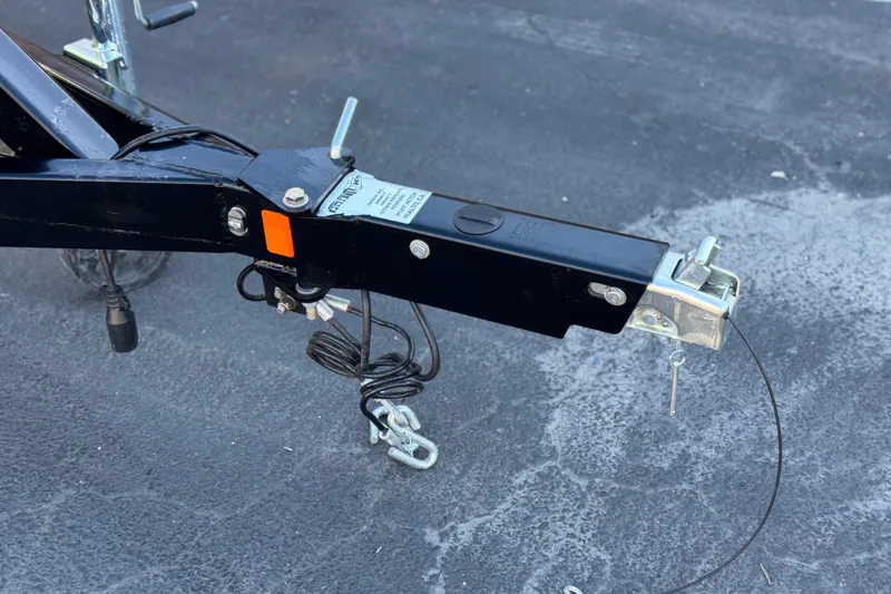 Slide: The Image of Trailer hitch of 2011 Harris Cruiser 220 CX on asphalt surface. - 27