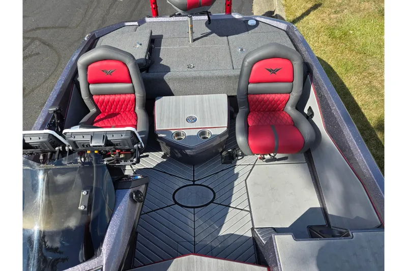 Slide: The Image of 2022 Vexus VX20 boat interior with red and black seats, advanced dashboard, and sleek design. - 20