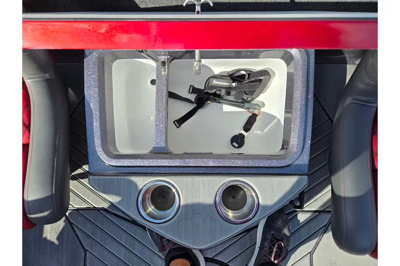Slide: The Image of 2022 Vexus VX20 boat interior with storage compartment and cup holders. - 21