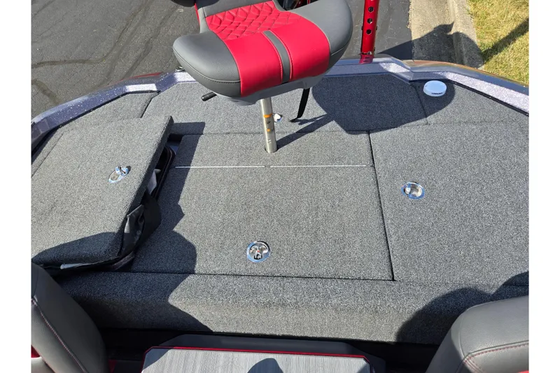 Slide: The Image of 2022 Vexus VX20 boat deck with red and gray seating, storage compartments. - 22