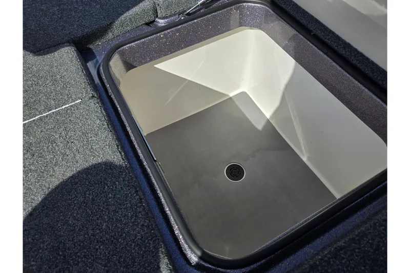 Slide: The Image of 2022 Vexus VX20 boat storage compartment with drain, featuring durable interior design. - 24