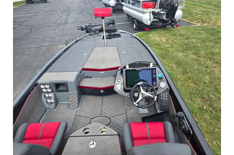 Slide: The Image of 2022 Vexus VX20 boat interior with modern dashboard and seating. - 11