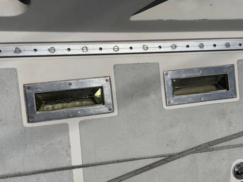 Slide: The Image of Alt text: "1982 Norseman 447 deck with metal fittings and rail." - 12