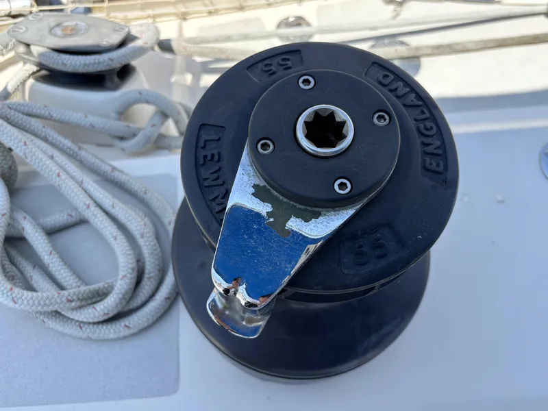 Slide: The Image of Sailboat winch on Norseman 447, 1982 model, with ropes and deck details. - 21