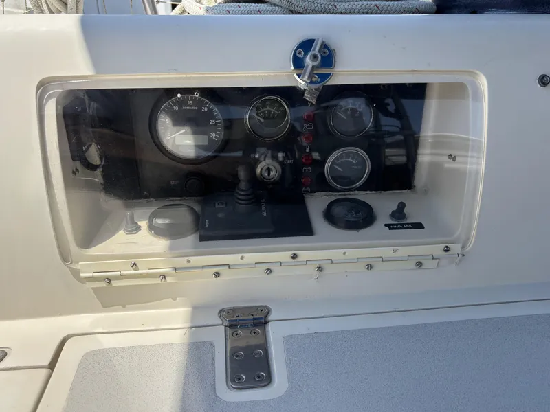 Slide: The Image of Control panel of a 1982 Norseman 447 boat with gauges and switches. - 23