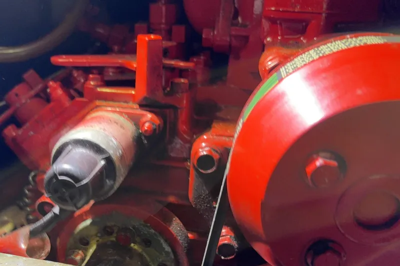 Slide: The Image of Close-up of a red Norseman 447 engine component, 1982 model. - 70