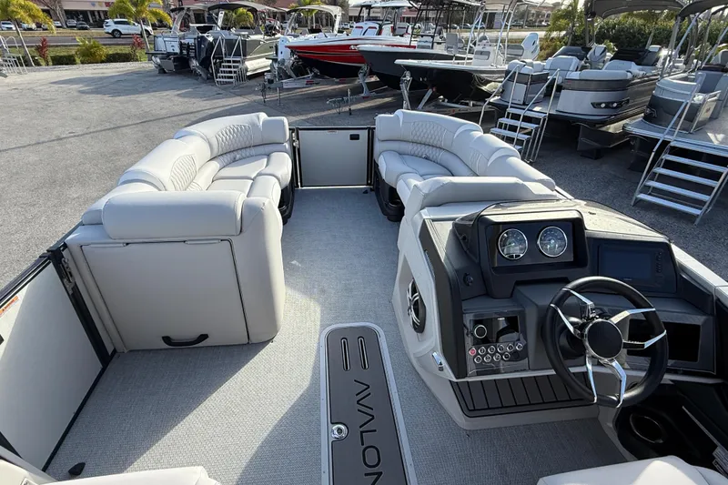 Slide: The Image of 2026 Avalon 2385 Catalina Quad Lounger, Tri Toon High Performance boat interior with plush seating. - 18