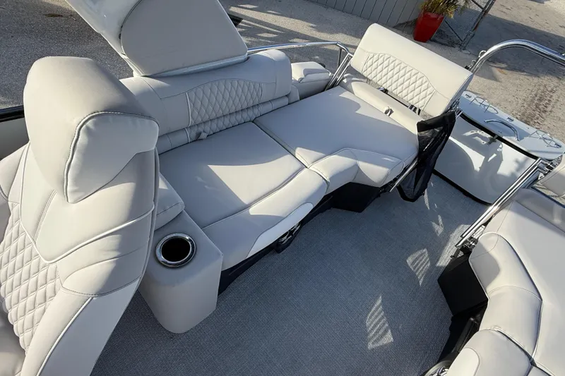 Slide: The Image of Luxurious seating on 2026 Avalon 2385 Catalina Quad Lounger, Tri Toon High Performance boat. - 24