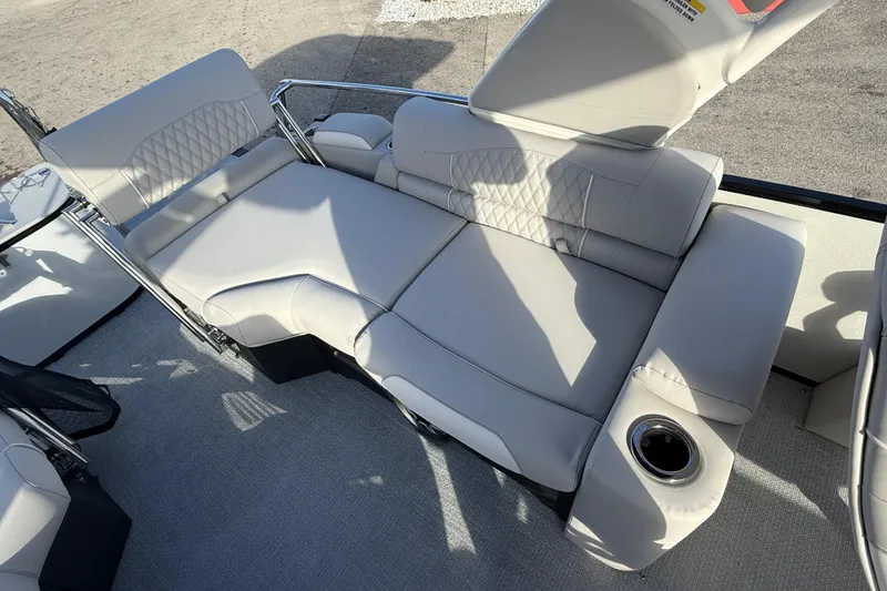 Slide: The Image of Luxurious seating on 2026 Avalon 2385 Catalina Quad Lounger, featuring premium upholstery and cup holder. - 25