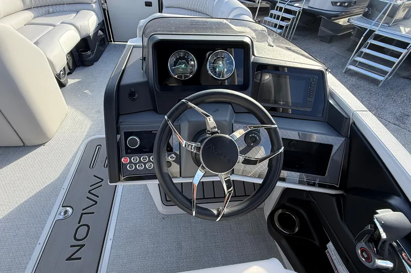 Slide: The Image of Steering console of 2026 Avalon 2385 Catalina Quad Lounger, featuring modern controls and dashboard. - 28