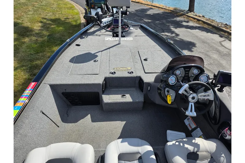 Slide: The Image of 2018 Tracker Pro Team 195 TXW 40th Anniversary Edition boat interior, featuring steering console and seating. - 11