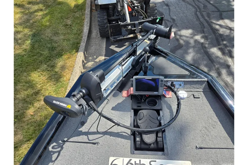 Slide: The Image of 2018 Tracker Pro Team 195 TXW boat with Minn Kota trolling motor and Lowrance fish finder. - 16