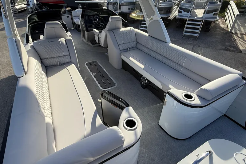Slide: The Image of 2026 Avalon 2585 Catalina Windshield Quad Lounger with luxurious seating and modern design. - 12
