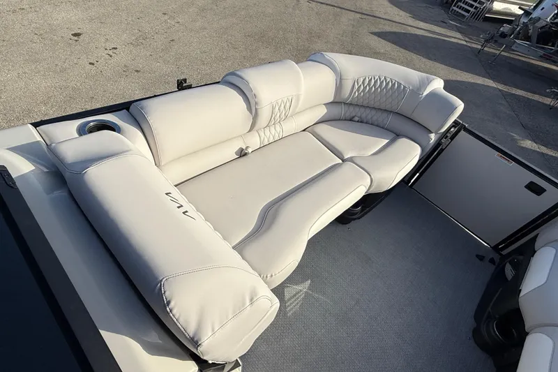 Slide: The Image of Luxurious seating on 2026 Avalon 2585 Catalina Windshield Quad Lounger boat, featuring premium upholstery. - 17