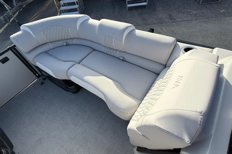 Slide: The Image of Luxurious seating on 2026 Avalon 2585 Catalina Windshield Quad Lounger boat. - 18