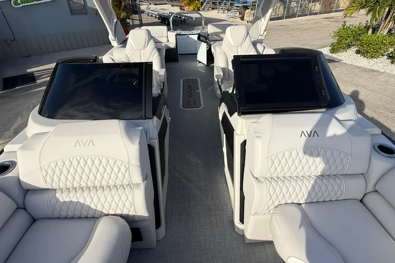 Slide: The Image of Luxurious 2026 Avalon 2585 Catalina boat interior with plush white seating and modern design. - 20