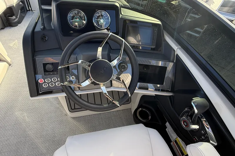 Slide: The Image of Steering console of 2026 Avalon 2585 Catalina Windshield Quad Lounger with advanced controls. - 26