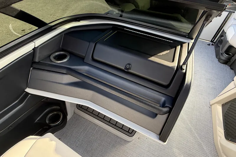 Slide: The Image of Interior of 2026 Avalon 2585 Catalina boat, featuring sleek design and cup holders. - 27