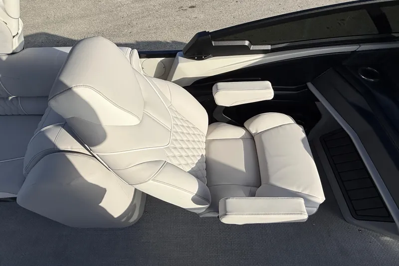 Slide: The Image of Luxurious seating in 2026 Avalon 2585 Catalina Windshield Quad Lounger boat, featuring premium upholstery. - 28