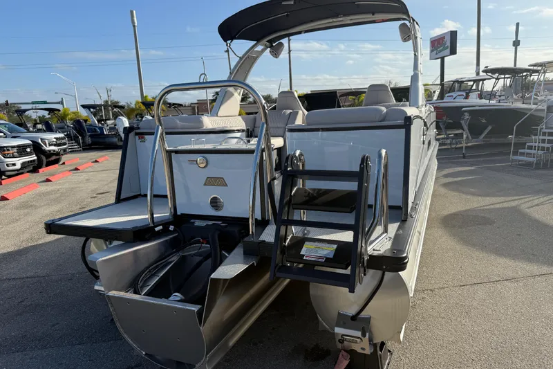 Slide: The Image of 2026 Avalon 2585 Catalina Windshield Quad Lounger with Mercury 400hp V-10 motor, rear view. - 7