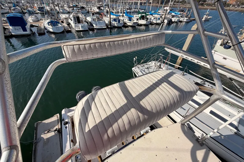 Slide: The Image of Grady-White Marlin 300 boat seat overlooking marina, 1993 model. - 14
