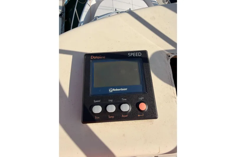 Slide: The Image of Speed display panel on 1993 Grady-White Marlin 300 boat dashboard. - 15