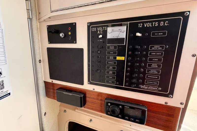 Slide: The Image of Electrical control panel on a 1993 Grady-White Marlin 300 boat. - 34