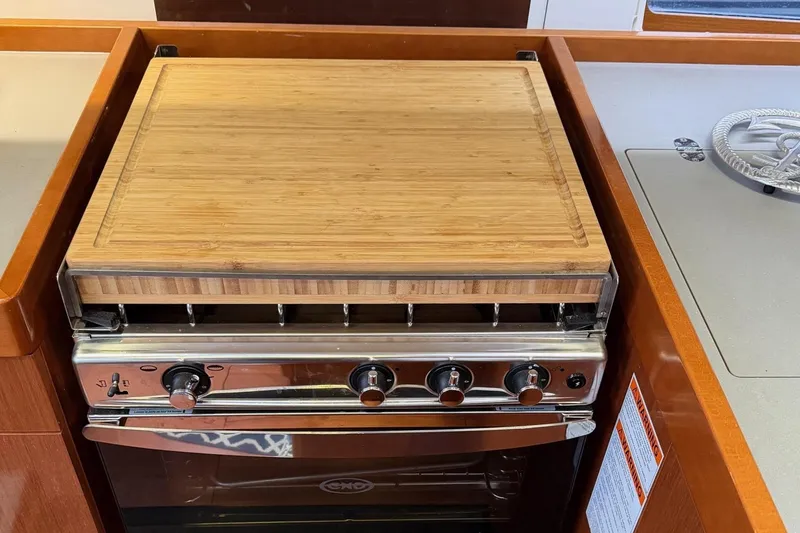 Slide: The Image of Stove and custom cutting board. - 21