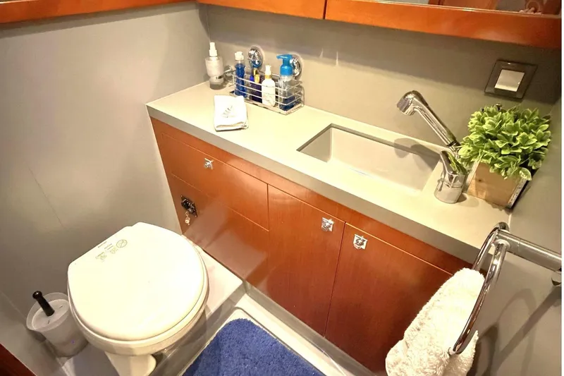 Slide: The Image of Master Berth/Suite - Head & Sink. - 28