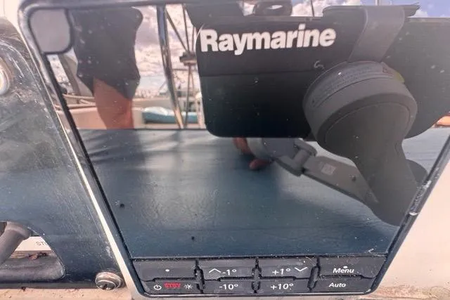 Slide: The Image of Raymarine navigation system on a 1989 Hylas 44 sailboat dashboard. - 37